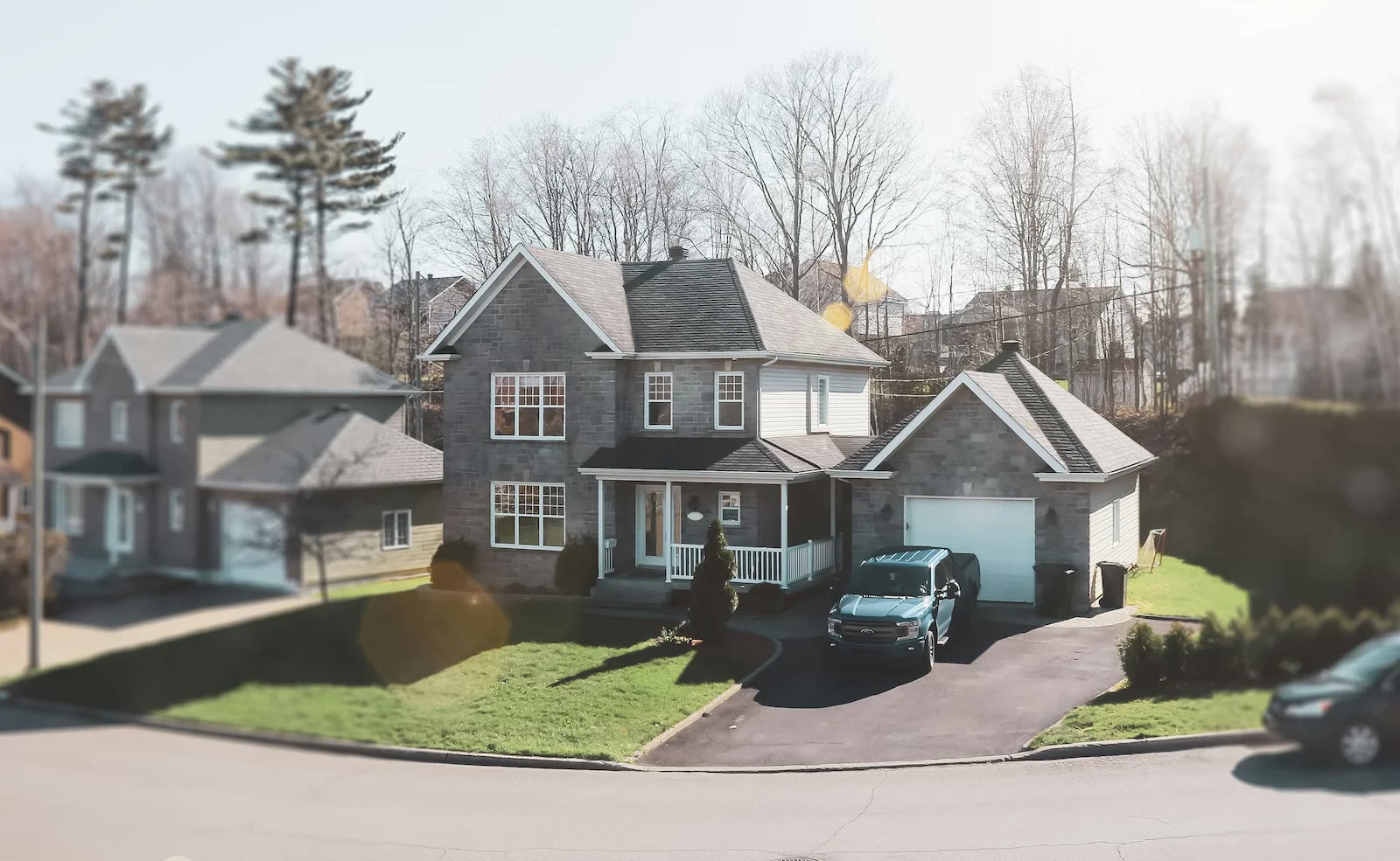 Large suburban brick home supported by Front Line