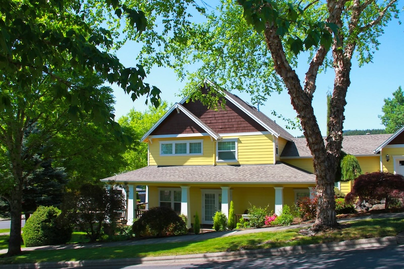 Yellow house requiring property coordination