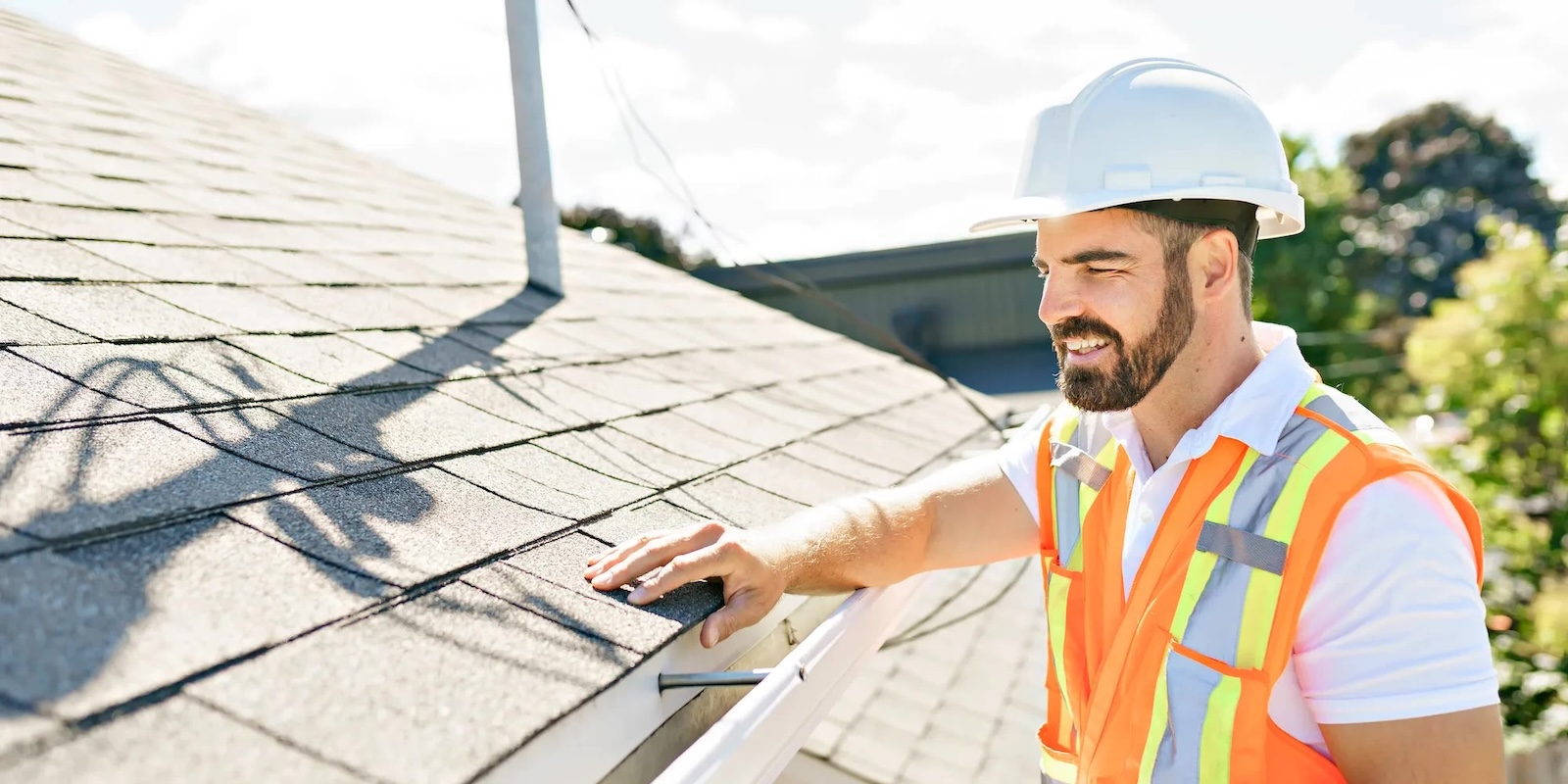 Roof inspector documenting field work